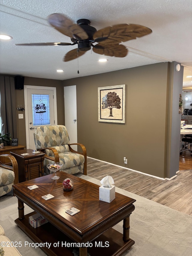 15693 Brookridge Blvd, Brooksville, FL 34613 - living area with a ceiling fan, wood finished floors, and recessed lighting