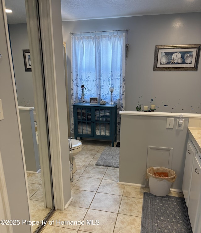 15693 Brookridge Blvd, Brooksville, FL 34613 - full bath featuring tile patterned floors, toilet, and vanity