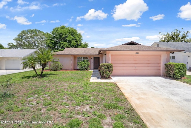 10820 Hachita Dr, Port Richey, FL 34668 - ranch-style home with an attached garage, stucco siding, concrete driveway, and a front yard
