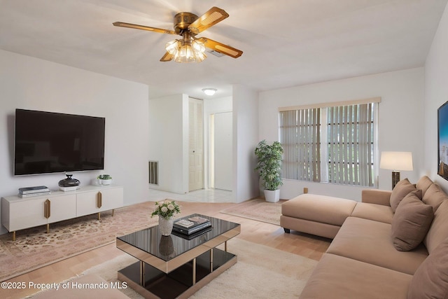 10820 Hachita Dr, Port Richey, FL 34668 - living room featuring wood finished floors and a ceiling fan