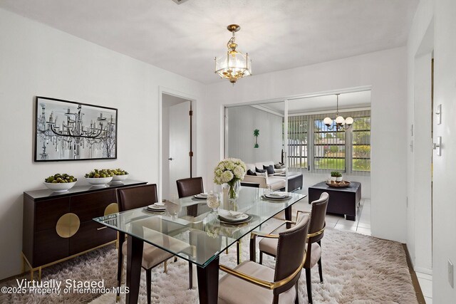 10820 Hachita Dr, Port Richey, FL 34668 - dining area with a chandelier