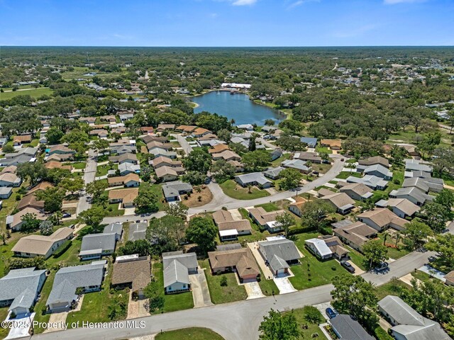 10820 Hachita Dr, Port Richey, FL 34668 - aerial view of property and surrounding area with a large body of water and nearby suburban area