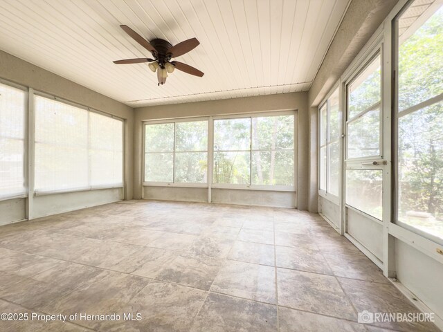 3095 Coronet Ct, Spring Hill, FL 34609 - unfurnished sunroom with a ceiling fan