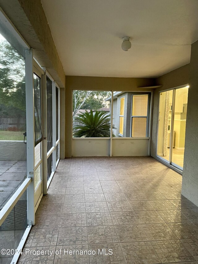 10448 Canary Ave, Weeki Wachee, FL 34613 - view of unfurnished sunroom