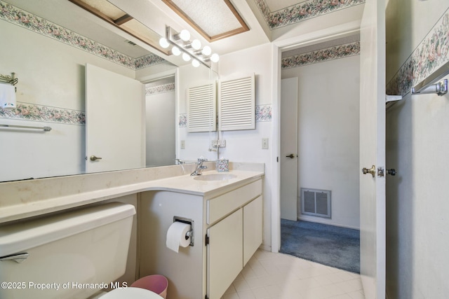 2183 Westchester Blvd, Spring Hill, FL 34606 - bathroom featuring vanity, tile patterned floors, and toilet