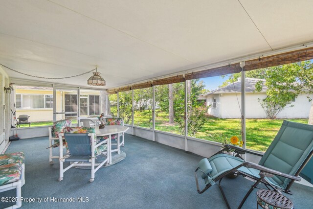 2183 Westchester Blvd, Spring Hill, FL 34606 - sunroom with outdoor dining area
