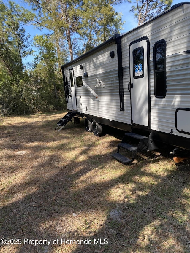 4035 Jason Rd, Spring Hill, FL 34608 - view of property exterior with entry steps