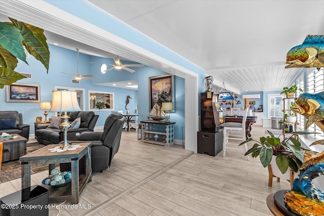 4387 6th Isle Dr, Hernando Beach, FL 34607 - living area featuring wood finished floors, ceiling fan, and baseboards