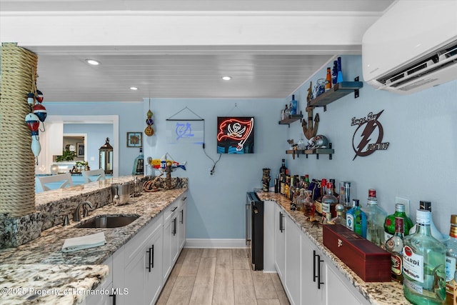 4387 6th Isle Dr, Hernando Beach, FL 34607 - indoor bar featuring a wall mounted air conditioner, light wood-style floors, recessed lighting, and baseboards