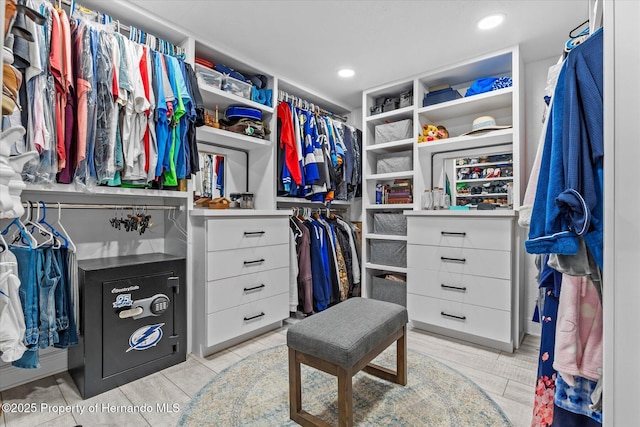 4387 6th Isle Dr, Hernando Beach, FL 34607 - spacious closet featuring light tile patterned floors
