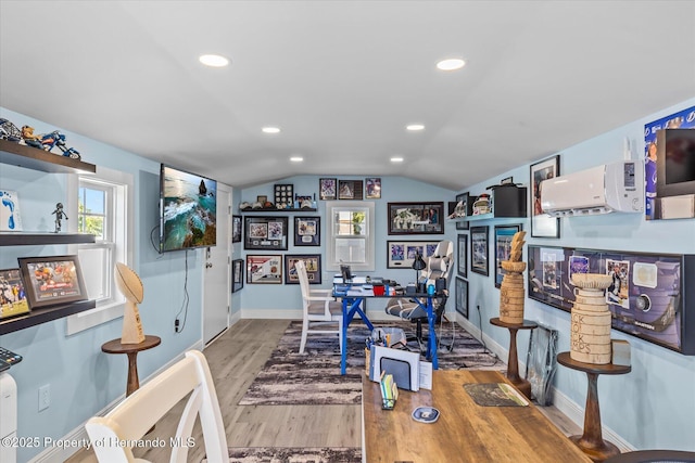 4387 6th Isle Dr, Hernando Beach, FL 34607 - office space featuring lofted ceiling, wood finished floors, baseboards, and recessed lighting