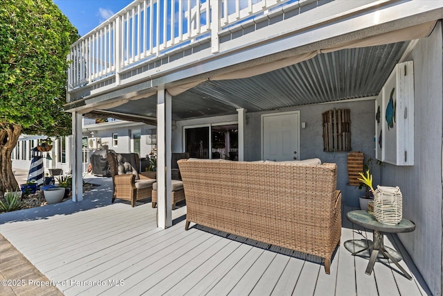 4387 6th Isle Dr, Hernando Beach, FL 34607 - wooden deck featuring an outdoor hangout area