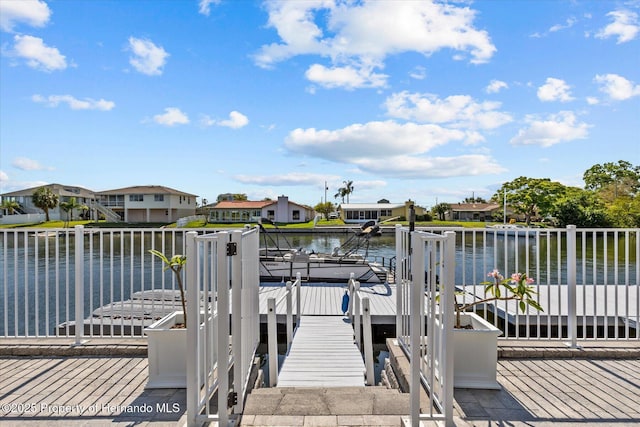 4387 6th Isle Dr, Hernando Beach, FL 34607 - dock with a water view, boat lift, and a residential view