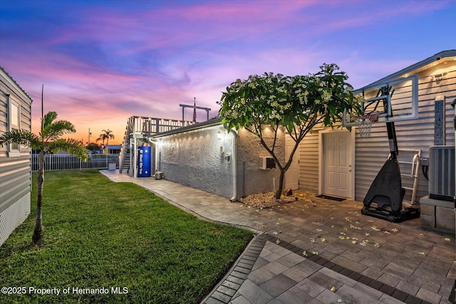 4387 6th Isle Dr, Hernando Beach, FL 34607 - view of yard with central AC and a patio area