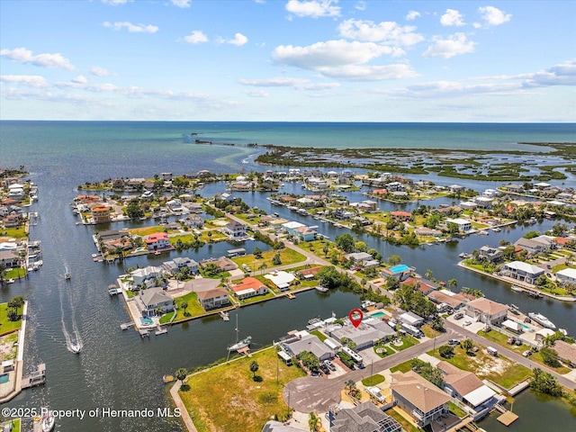 4387 6th Isle Dr, Hernando Beach, FL 34607 - aerial perspective of suburban area featuring a nearby body of water
