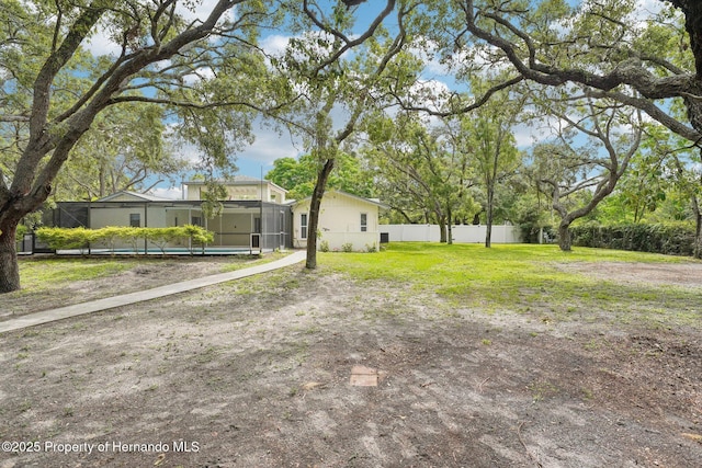 18633 Oak Way Dr, Hudson, FL 34667 - view of yard with a lanai