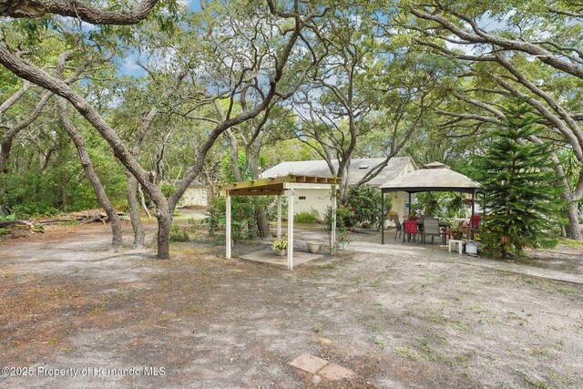 18633 Oak Way Dr, Hudson, FL 34667 - view of yard with a gazebo