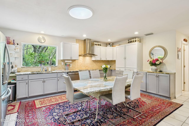 18633 Oak Way Dr, Hudson, FL 34667 - dining area featuring light tile patterned flooring and recessed lighting