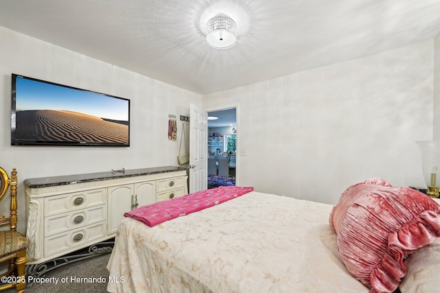 18633 Oak Way Dr, Hudson, FL 34667 - bedroom with dark carpet