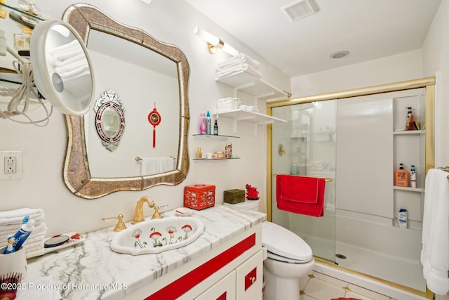 18633 Oak Way Dr, Hudson, FL 34667 - bathroom with a stall shower, vanity, toilet, and tile patterned floors