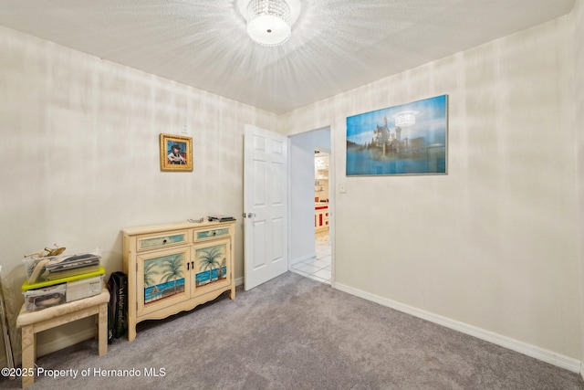 18633 Oak Way Dr, Hudson, FL 34667 - bedroom with carpet and baseboards