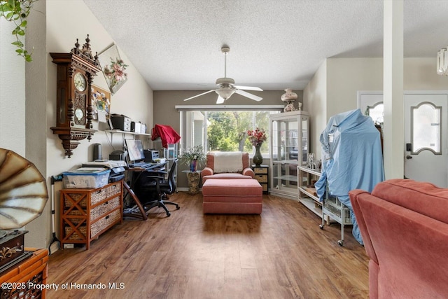 10267 Elgin Blvd, Spring Hill, FL 34608 - home office featuring wood finished floors, ceiling fan, and a textured ceiling