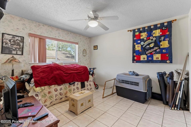 10267 Elgin Blvd, Spring Hill, FL 34608 - tiled bedroom with wallpapered walls, a textured ceiling, and ceiling fan