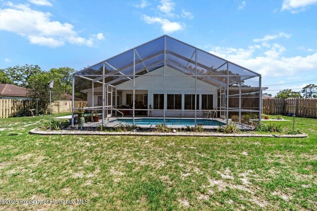 10267 Elgin Blvd, Spring Hill, FL 34608 - back of property with a lanai