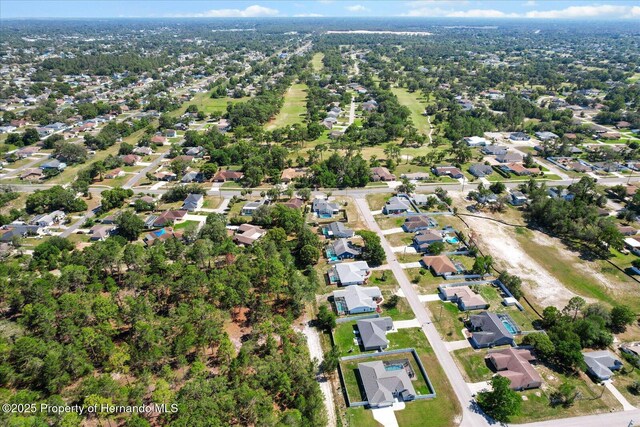 10267 Elgin Blvd, Spring Hill, FL 34608 - aerial view of property and surrounding area with nearby suburban area
