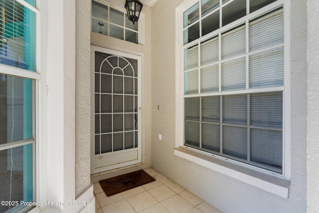 9407 Burnam Dr, Weeki Wachee, FL 34613 - entrance to property with stucco siding