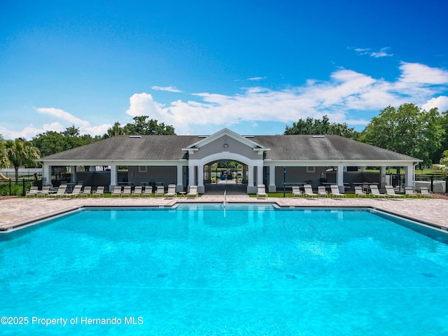 14137 Wake Robin Dr, Brooksville, FL 34604 - community pool with a patio area