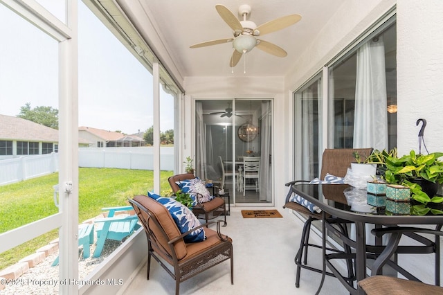 224 W Rexford Dr, Beverly Hills, FL 34465 - sunroom / solarium with a ceiling fan and outdoor dining area