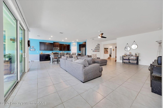 13454 Golden Lime Ave, Spring Hill, FL 34609 - living area with light tile patterned flooring, ceiling fan, and recessed lighting