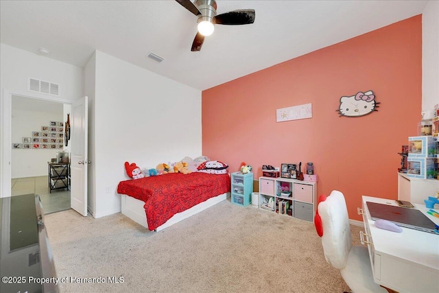 13454 Golden Lime Ave, Spring Hill, FL 34609 - carpeted bedroom featuring ceiling fan and baseboards