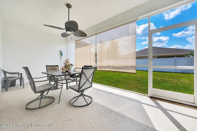 13454 Golden Lime Ave, Spring Hill, FL 34609 - sunroom / solarium with outdoor dining area and ceiling fan