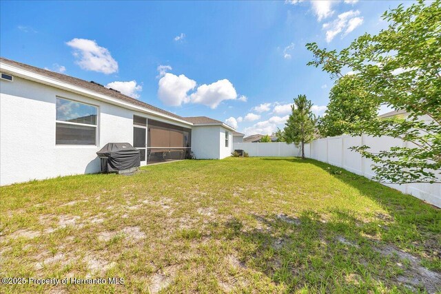 13454 Golden Lime Ave, Spring Hill, FL 34609 - view of yard featuring a sunroom