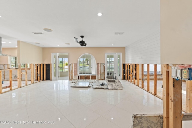 3226 Gardenia Dr, Hernando Beach, FL 34607 - tiled spare room with healthy amount of natural light, a sink, and recessed lighting