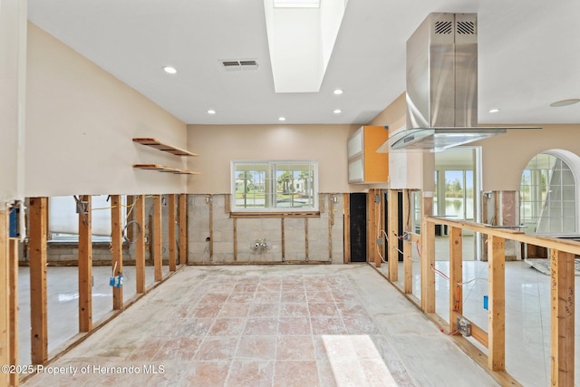 3226 Gardenia Dr, Hernando Beach, FL 34607 - interior space with plenty of natural light, recessed lighting, and island exhaust hood