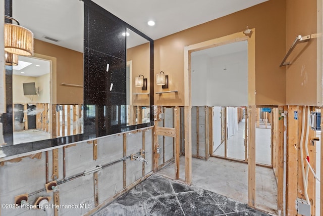 3226 Gardenia Dr, Hernando Beach, FL 34607 - bathroom featuring recessed lighting and marble finish floors