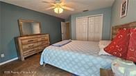 455 Cressida Cir, Spring Hill, FL 34609 - bedroom with baseboards, a closet, and ceiling fan