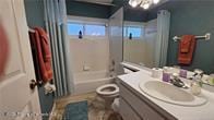 455 Cressida Cir, Spring Hill, FL 34609 - full bath with vanity, toilet, and shower / bath combination