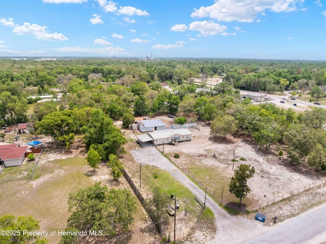 16040 Platinum Dr, Spring Hill Pasco, FL 34610 - drone / aerial view of a heavily wooded area