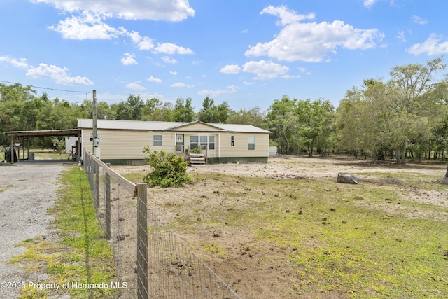 16040 Platinum Dr, Spring Hill Pasco, FL 34610 - view of front facade with a carport and driveway