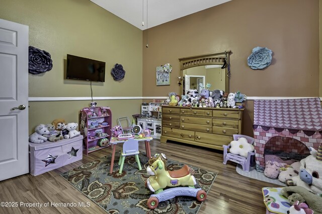 1086 Hook Dr, Spring Hill, FL 34608 - bedroom featuring wood finished floors