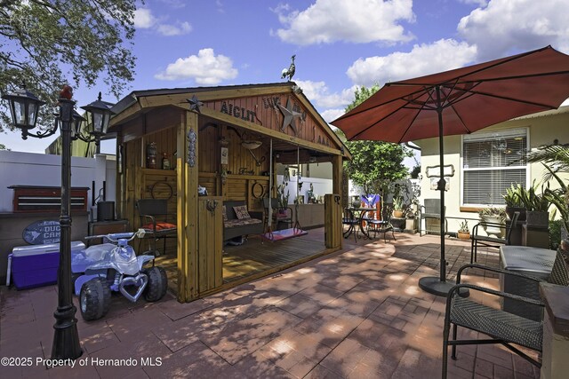 1086 Hook Dr, Spring Hill, FL 34608 - view of patio featuring a deck