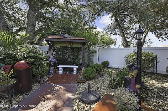 1086 Hook Dr, Spring Hill, FL 34608 - fenced backyard featuring a patio area