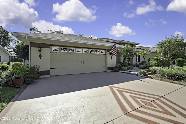 1086 Hook Dr, Spring Hill, FL 34608 - single story home with a garage, concrete driveway, stucco siding, and roof with shingles