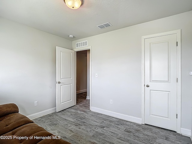 277 Hampshire Ave, Spring Hill, FL 34606 - bedroom with wood finished floors and baseboards