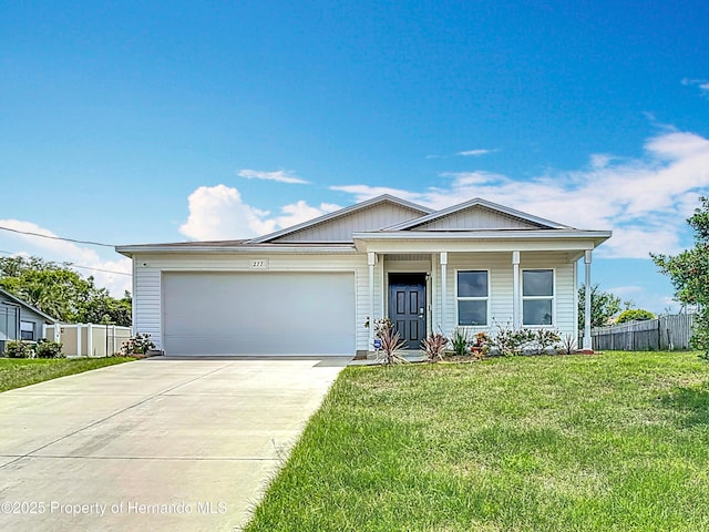 277 Hampshire Ave, Spring Hill, FL 34606 - view of front of house with driveway and a garage