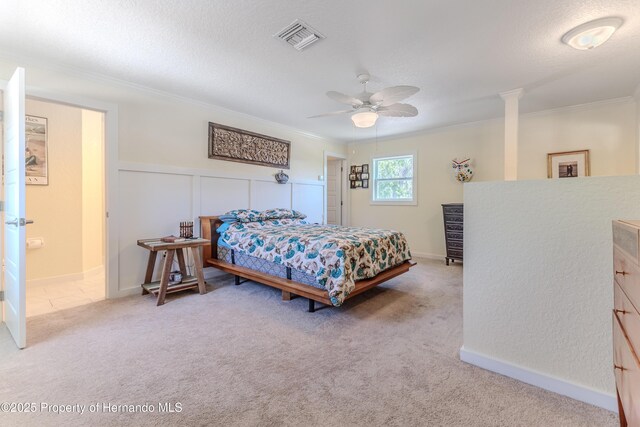 5507 Darlene St, Weeki Wachee, FL 34607 - carpeted bedroom with crown molding, ceiling fan, a textured ceiling, and baseboards